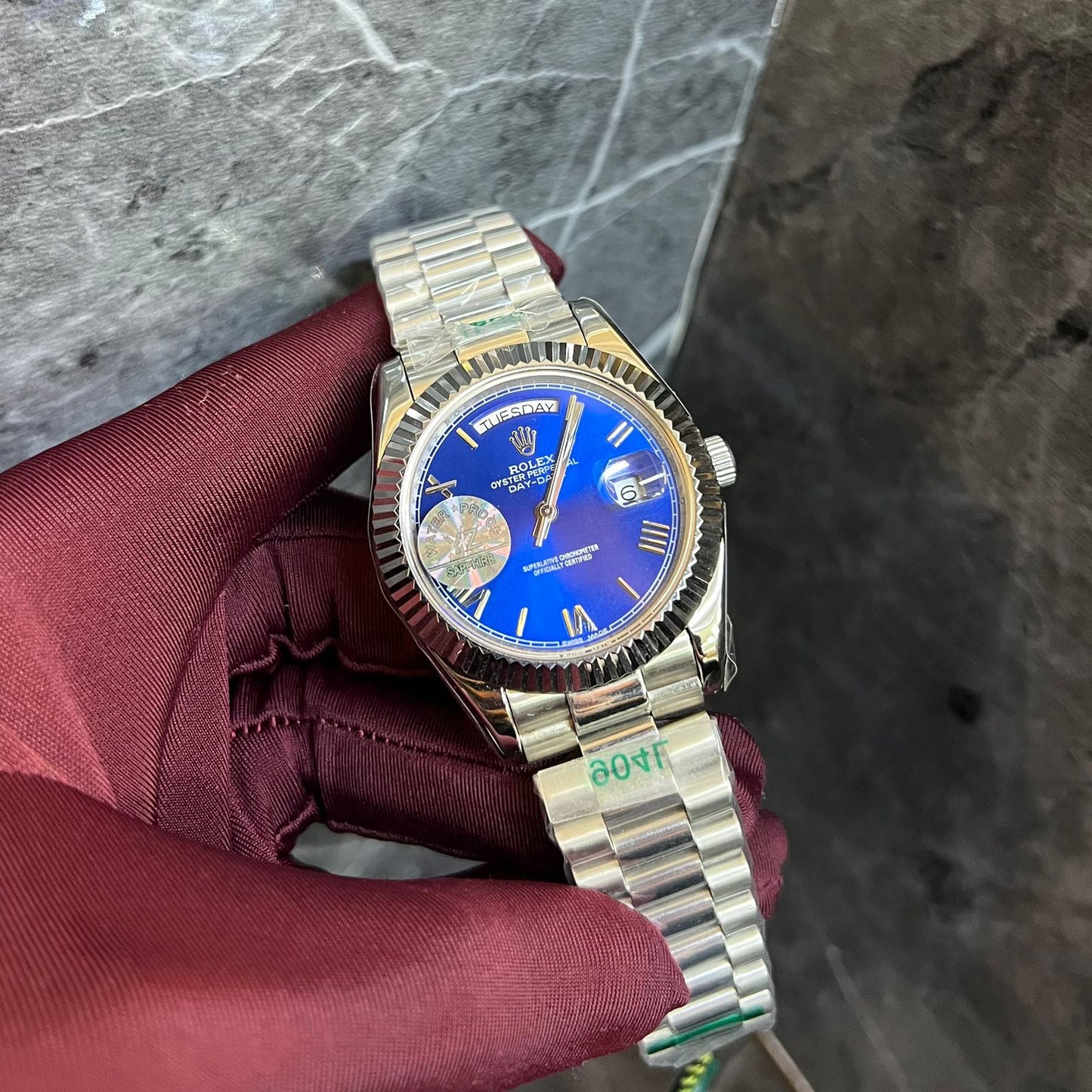 Rolex Day-Date Watch with a Blue Dial and a Fluted Bezel