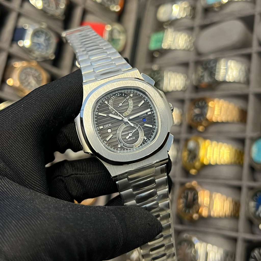 Patek Philippe Nautilus Travel Time Chronograph in Stainless Steel with a Black-Gradient Dial