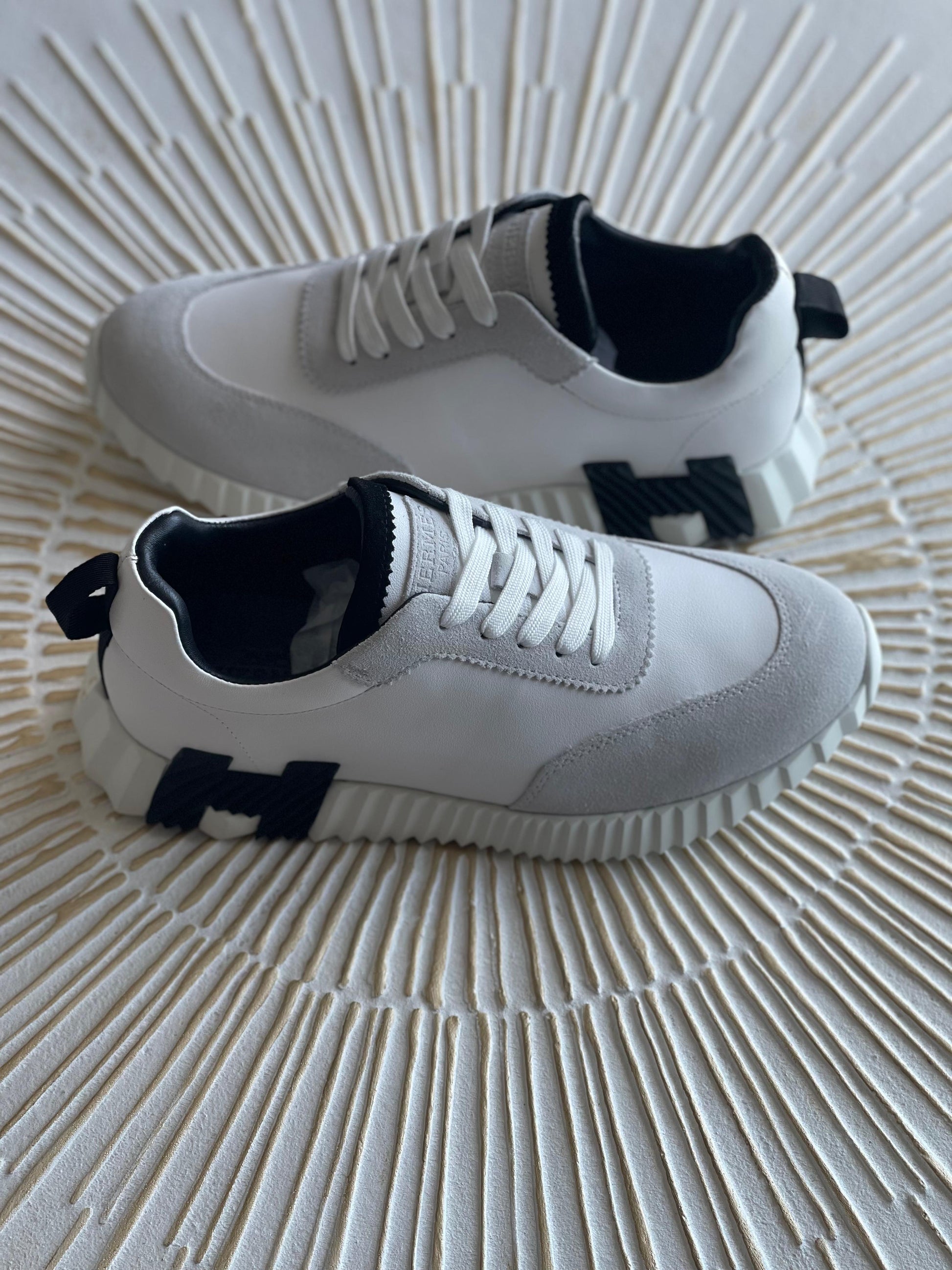 Hermès Leather Logo Sneakers – White Calfskin Low-Top