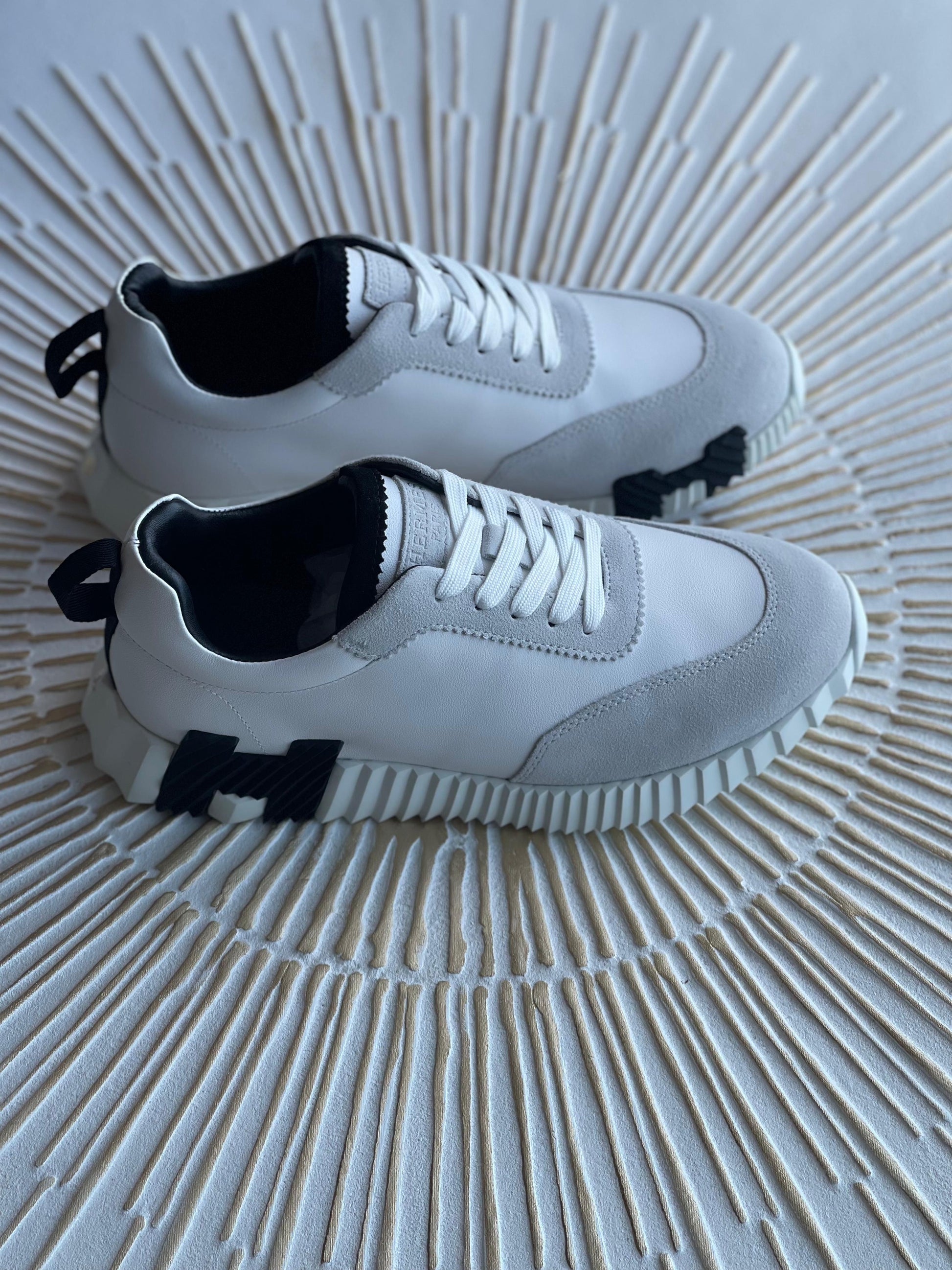 Hermès Leather Logo Sneakers – White Calfskin Low-Top