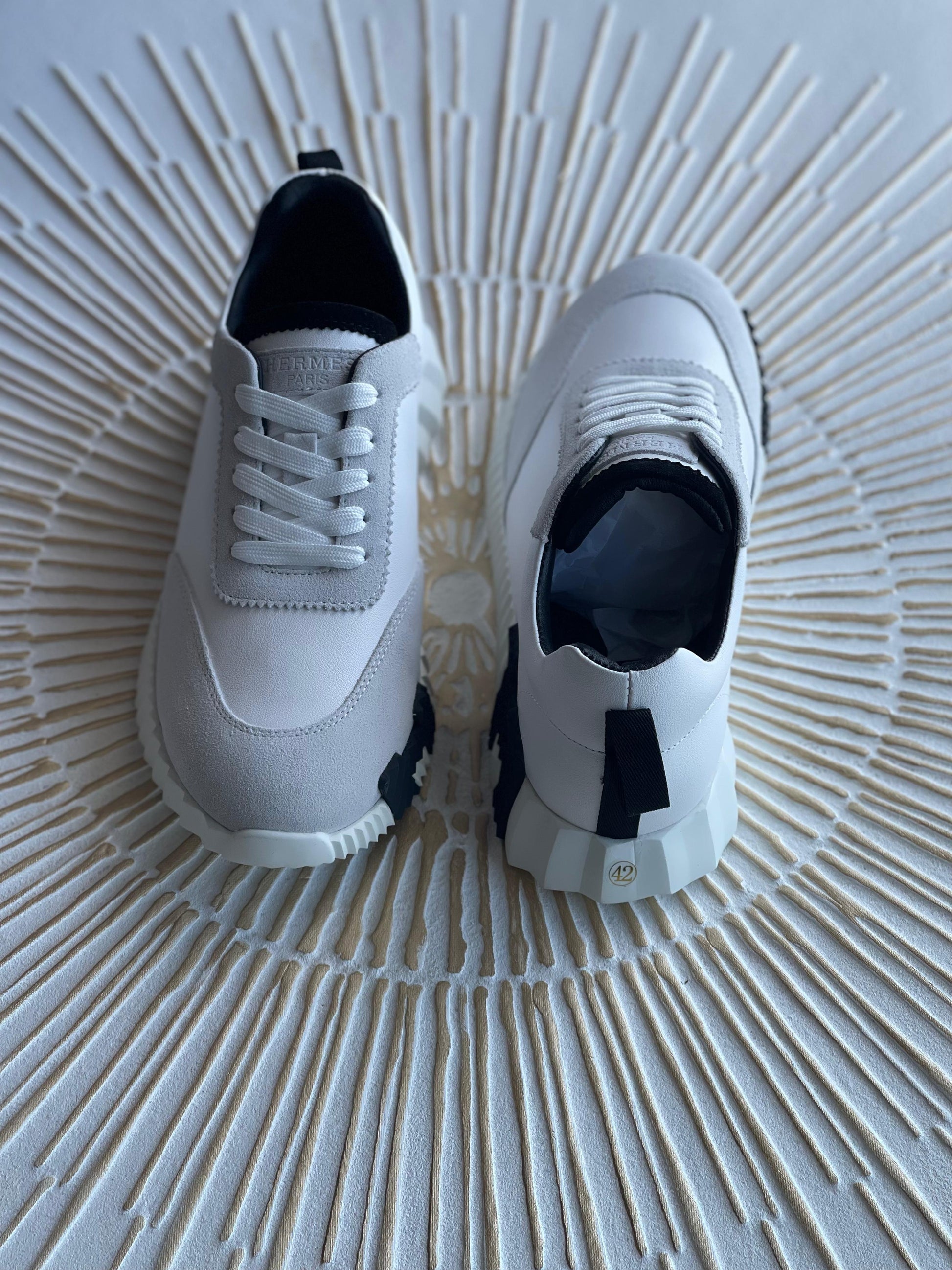 Hermès Leather Logo Sneakers – White Calfskin Low-Top
