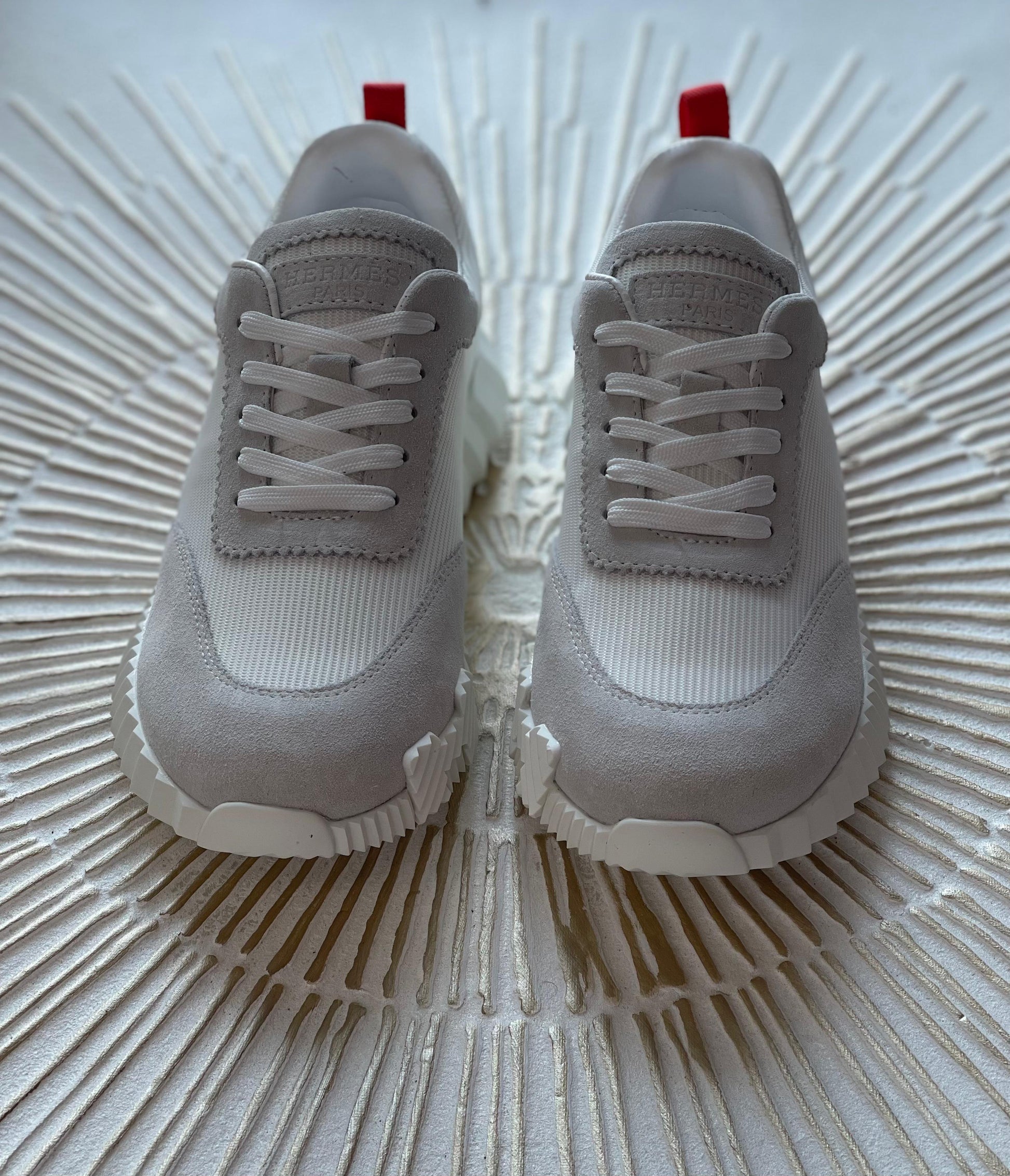 Hermès Bouncing Sneaker in White Calfskin & Suede – Lightweight Urban Elegance.