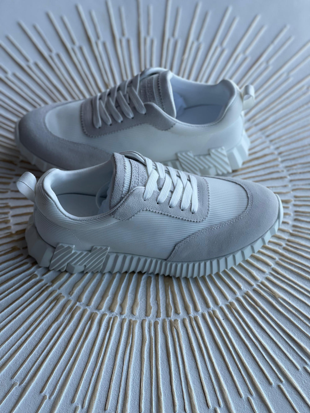 Hermès Paris Bouncing Sneaker in Triple White – All-White Calfskin & Mesh Urban Sneaker.