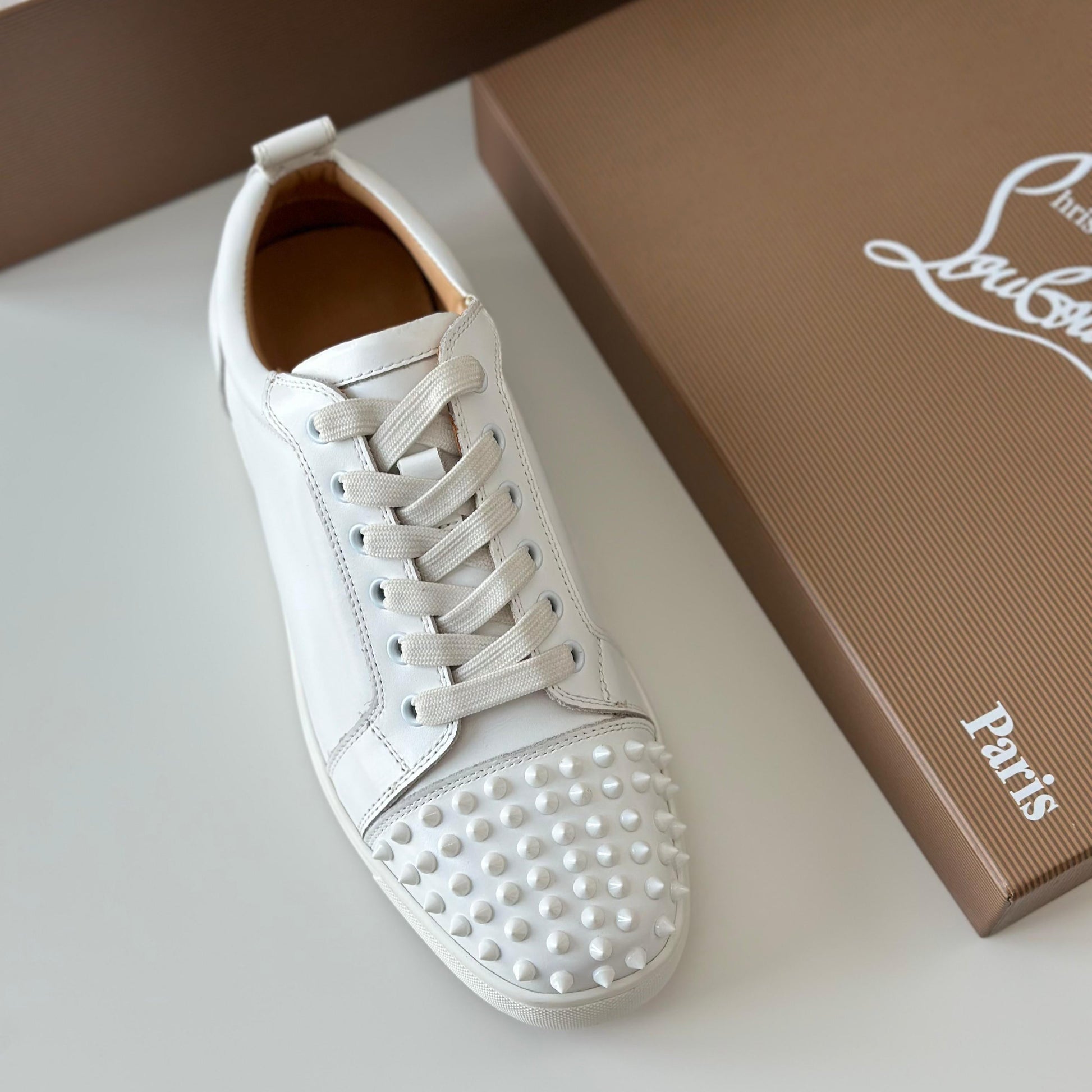 Christian Louboutin Louis Junior Spikes Sneakers – White Calf Leather with Toe Spikes