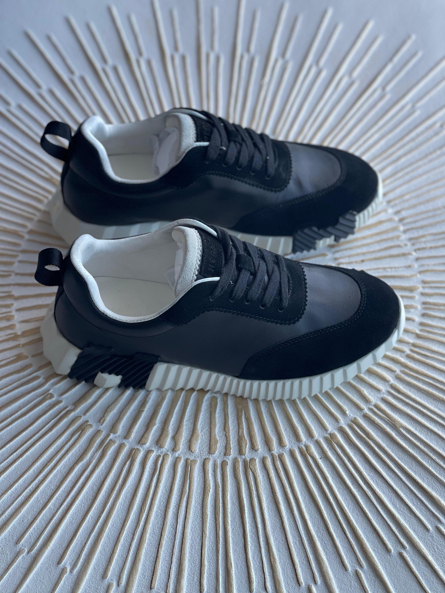 Hermès Bouncing Sneaker – Black Leather & Suede Low-Top with Oversized H Motif