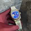 Rolex Day-Date Watch with a Blue Dial and a Fluted Bezel
