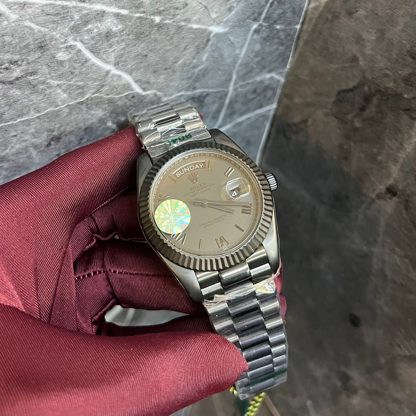 Rolex Day-Date Or Datejust watch with a Fluted Bezel and a Jubilee Bracelet