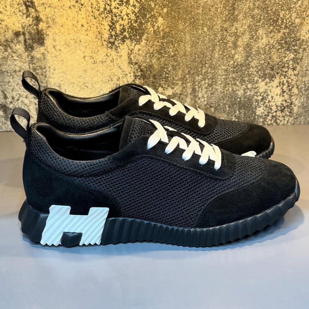 Hermés Bouncing Sneakers in Black with a White H Logo On The Heel