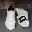 Hermés Bouncing Sneakers in a White and Black Colorway