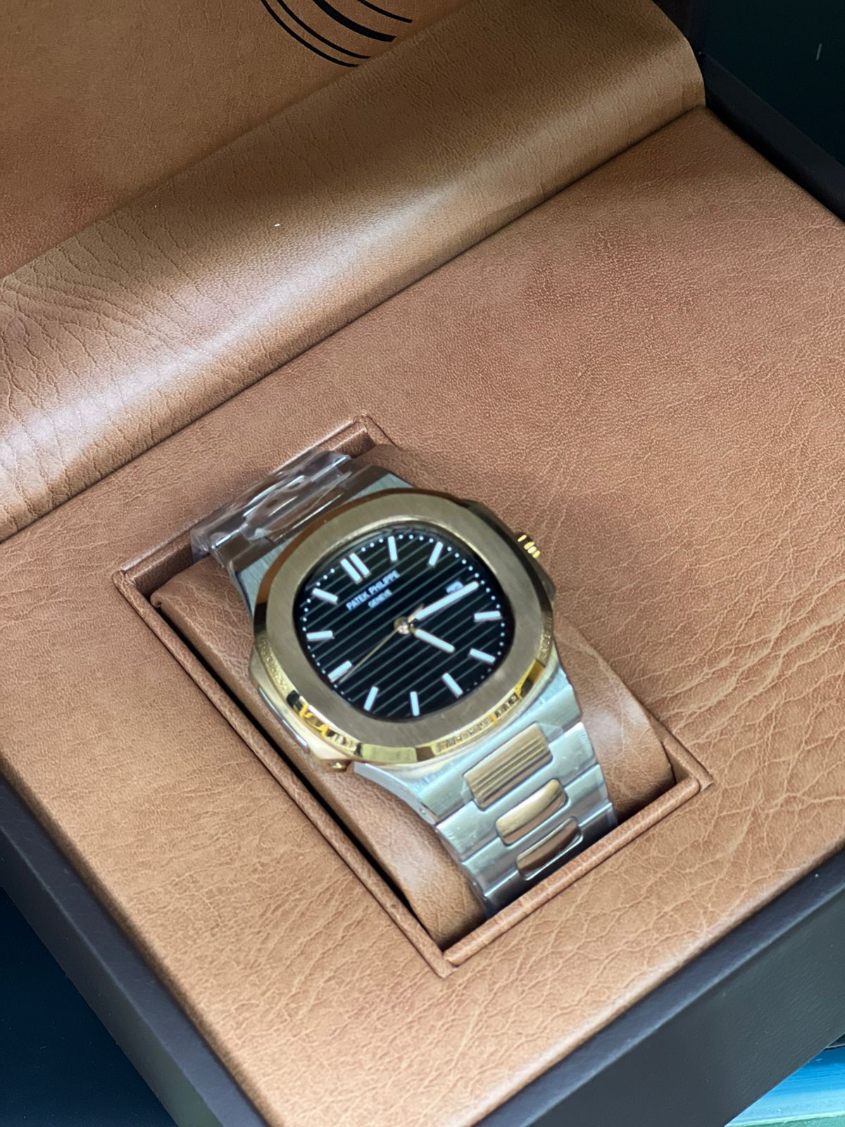 Patek Philippe Nautilus Watch with a Two-tone Metal Bracelet and a Blue Dial