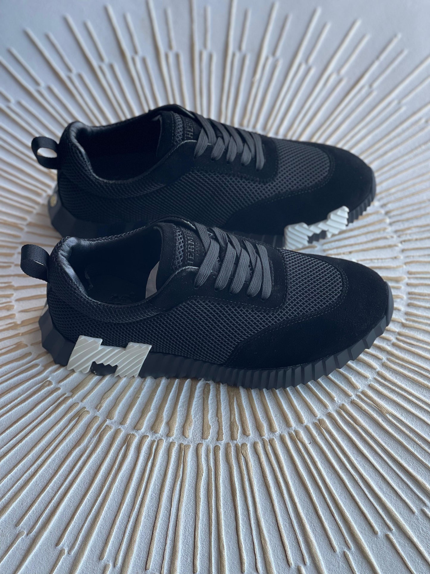 Hermès Bouncing Sneaker – Black Mesh & Suede Goatskin with White “H” Heel Detail (Men’s, Style H232856ZH01415)