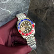 Rolex GMT-Master II with a two-color Cerachrom Bezel Insert in Red and Blue Ceramic