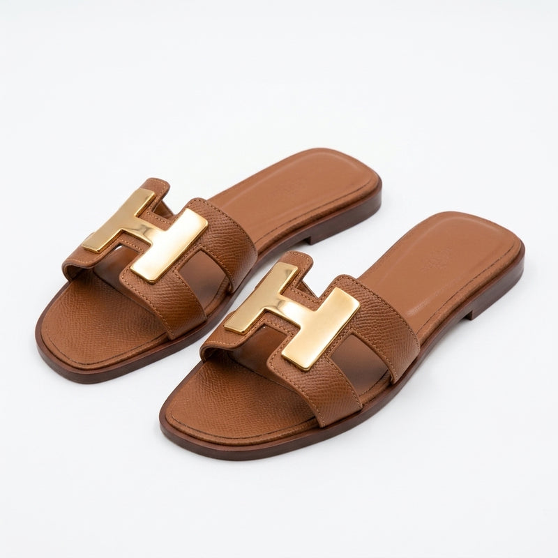 Hermès Women Metal H Flat Slides | Brown
