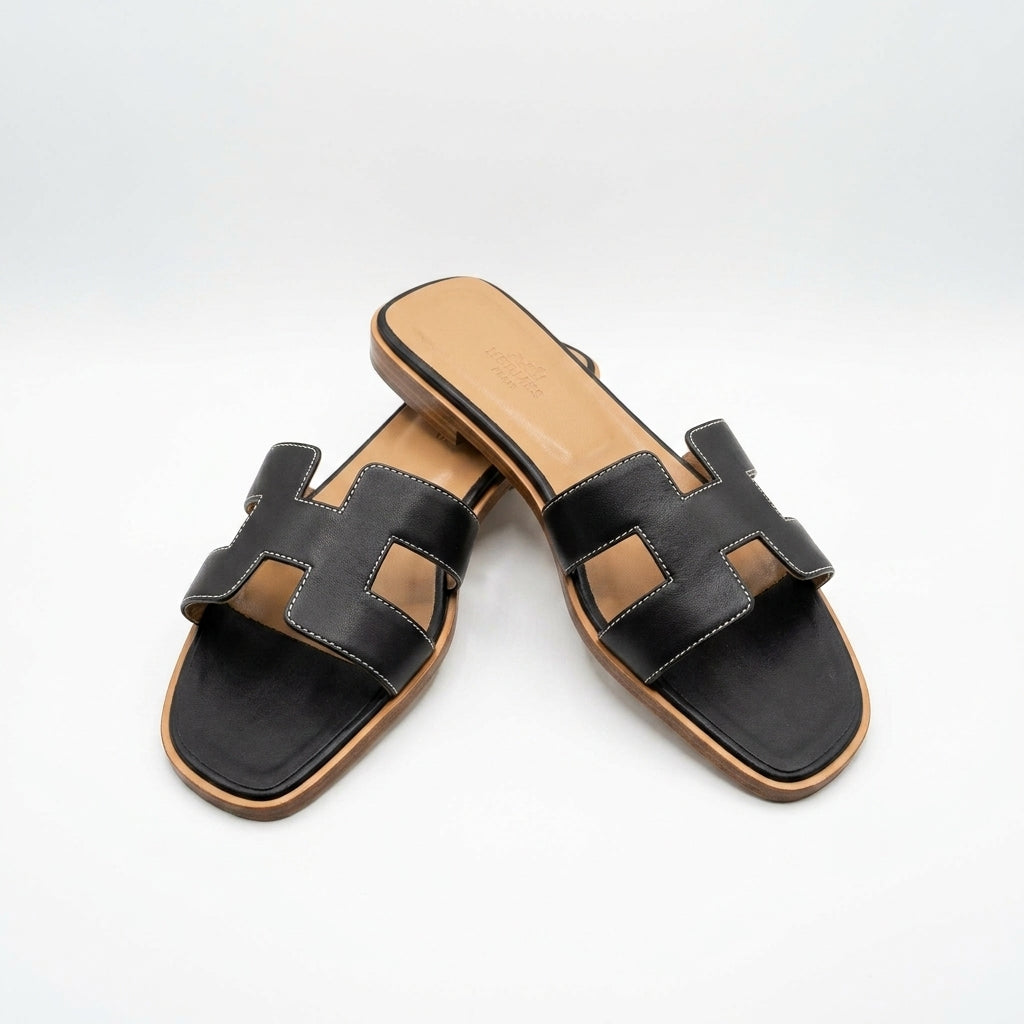 Hermès Women Oran Flat Slides | Black with Tan Footbed