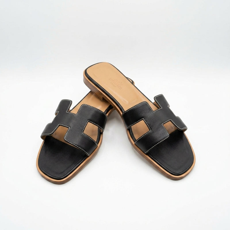 Hermès Women Oran Flat Slides | Black with Tan Footbed