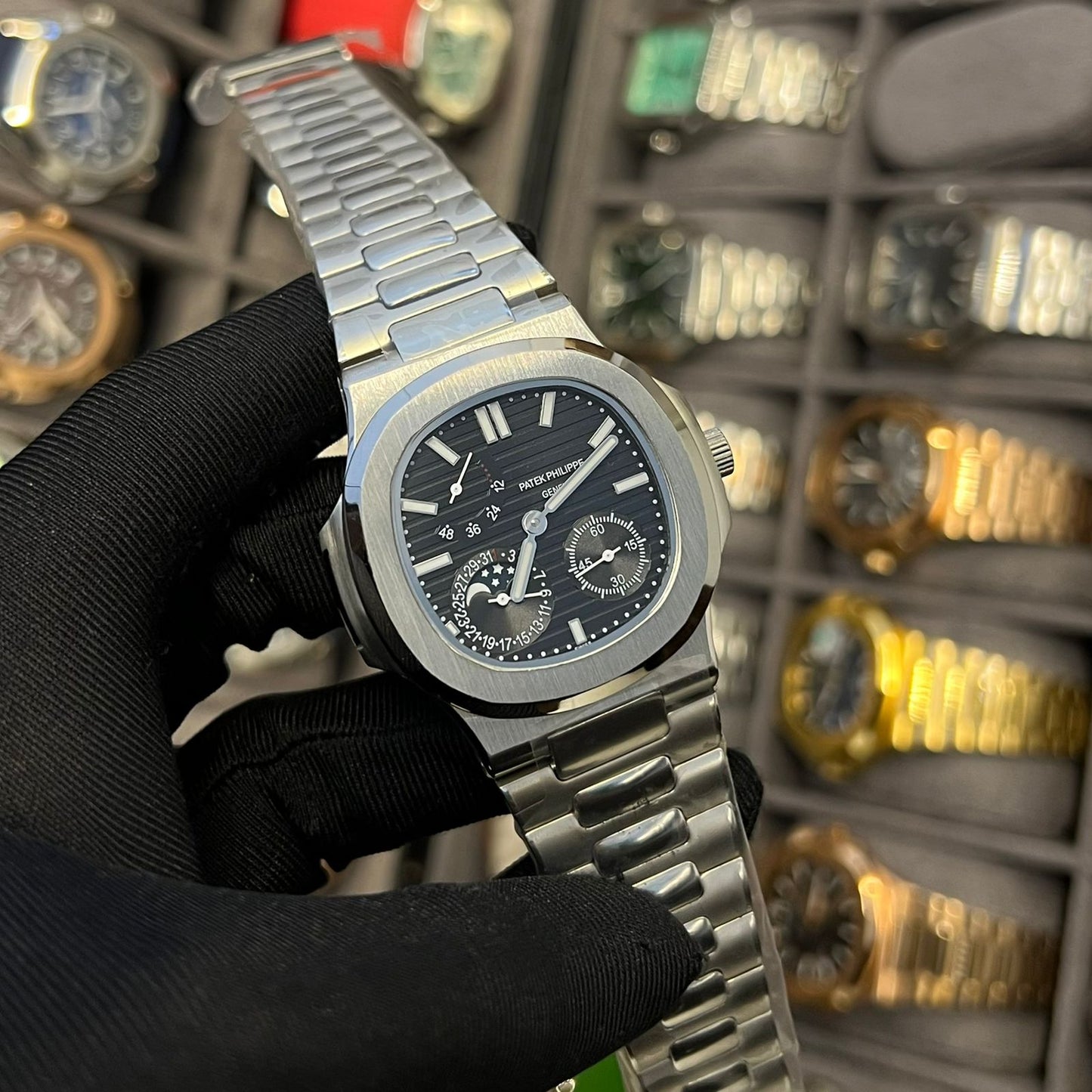 Patek Philippe Nautilus Moon Phase Blue Striped Dial Steel Watch 5712/1A-001