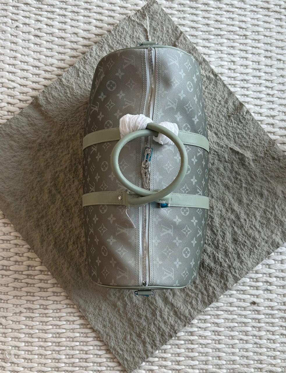 Louis Vuitton Keepall Bandouliére Travel Bag in a Gray and Black Monogram Pattern
